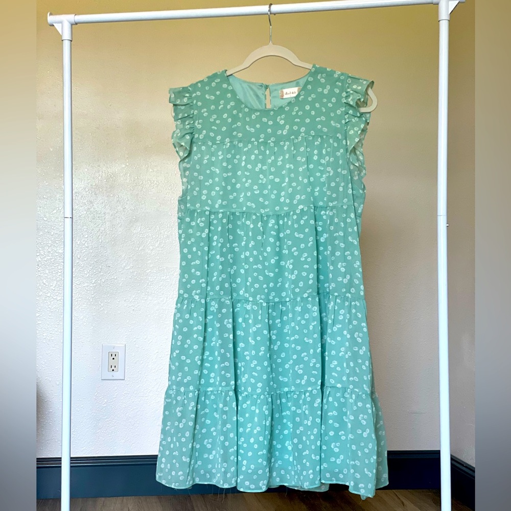 Flowy summer dress. Light mint color with floral pattern.